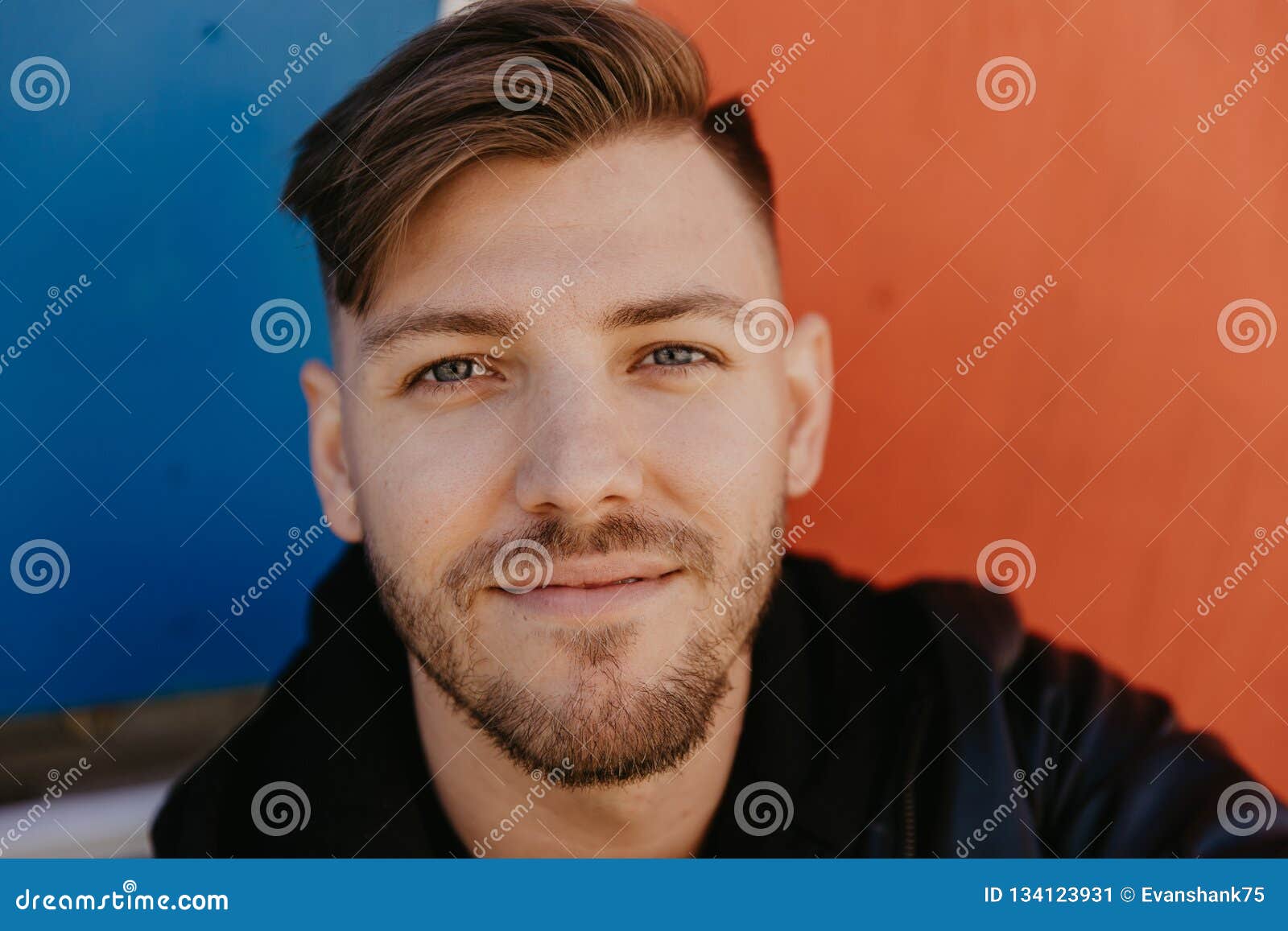 handsome attractive male adult person model in winter autumn season head shots face up close expression portraits vivid colors