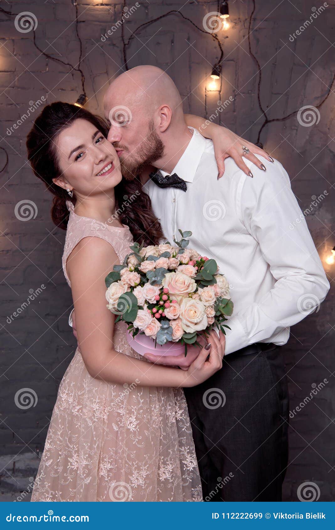 girl and bald guy