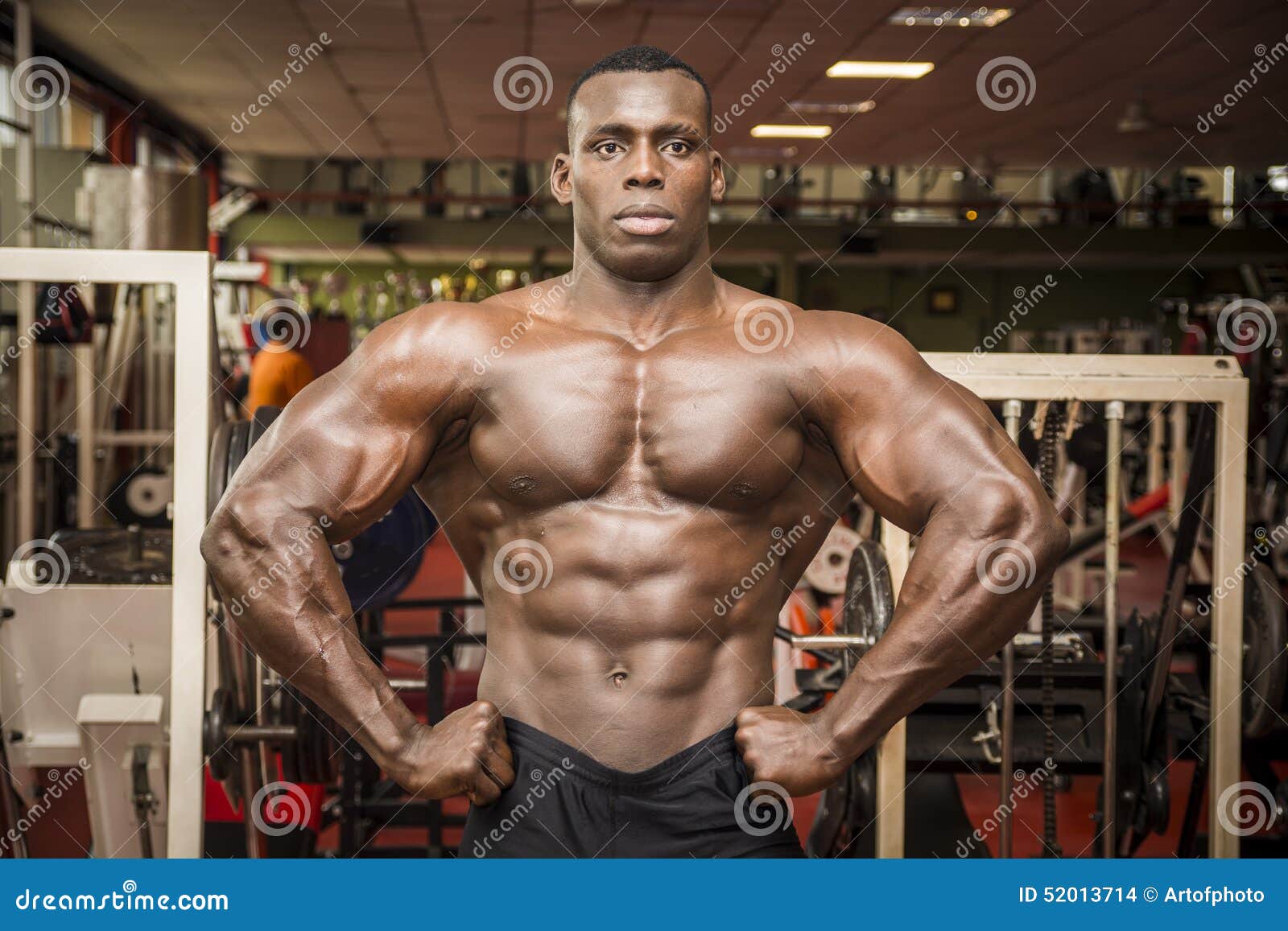 Free Photos - A Muscular Man Is Posing In A Gym, Showcasing His Impressive  Physique. He Is Standing In Front Of A Mirror, Flexing His Muscles And  Smiling For The Camera. The