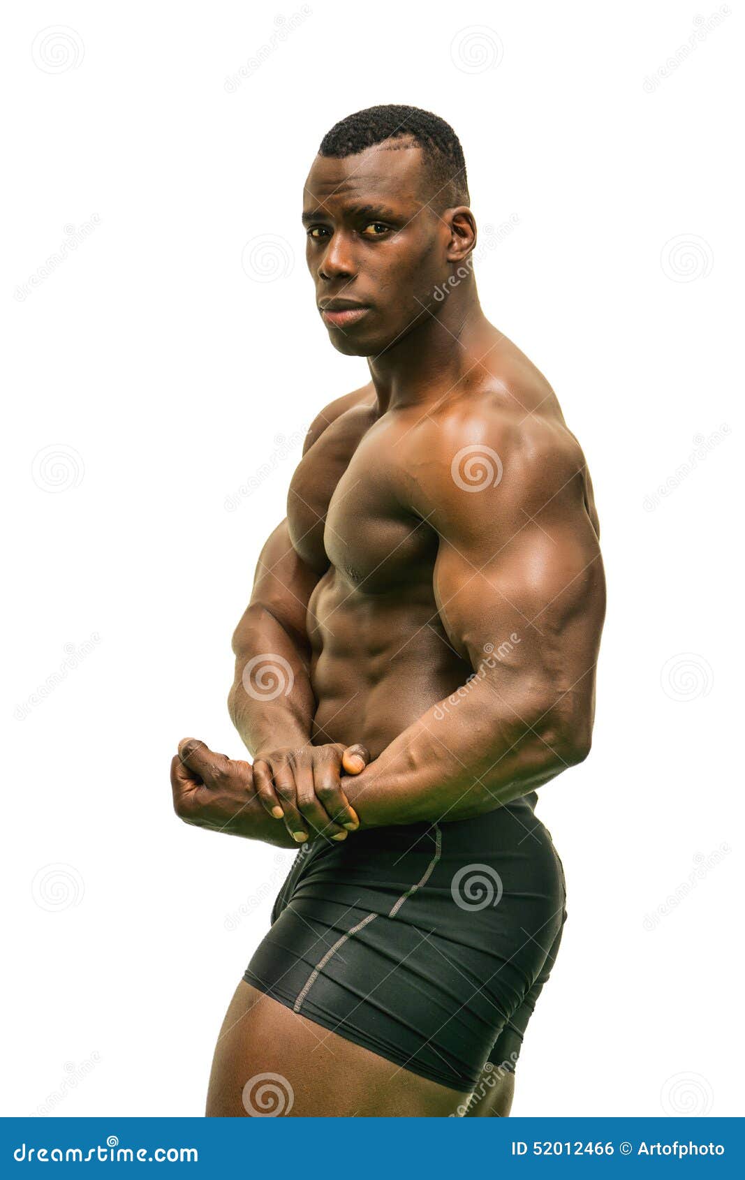 Black fitness model demonstrating side chest pose Stock Photo by  Prostock-studio