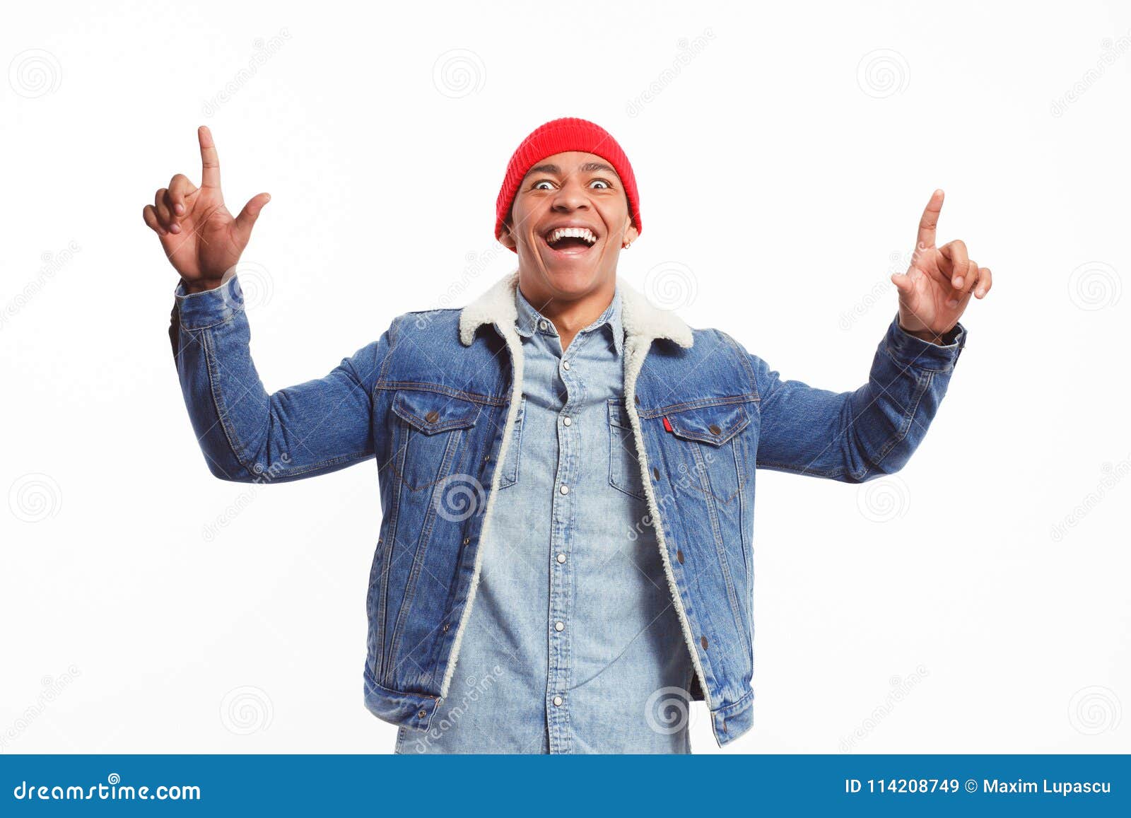 handsome-black-male-denim-hat-pointing-up-white-backdrop-looking-camera-amazement-super-excited-guy-pointing-up-114208749.jpg