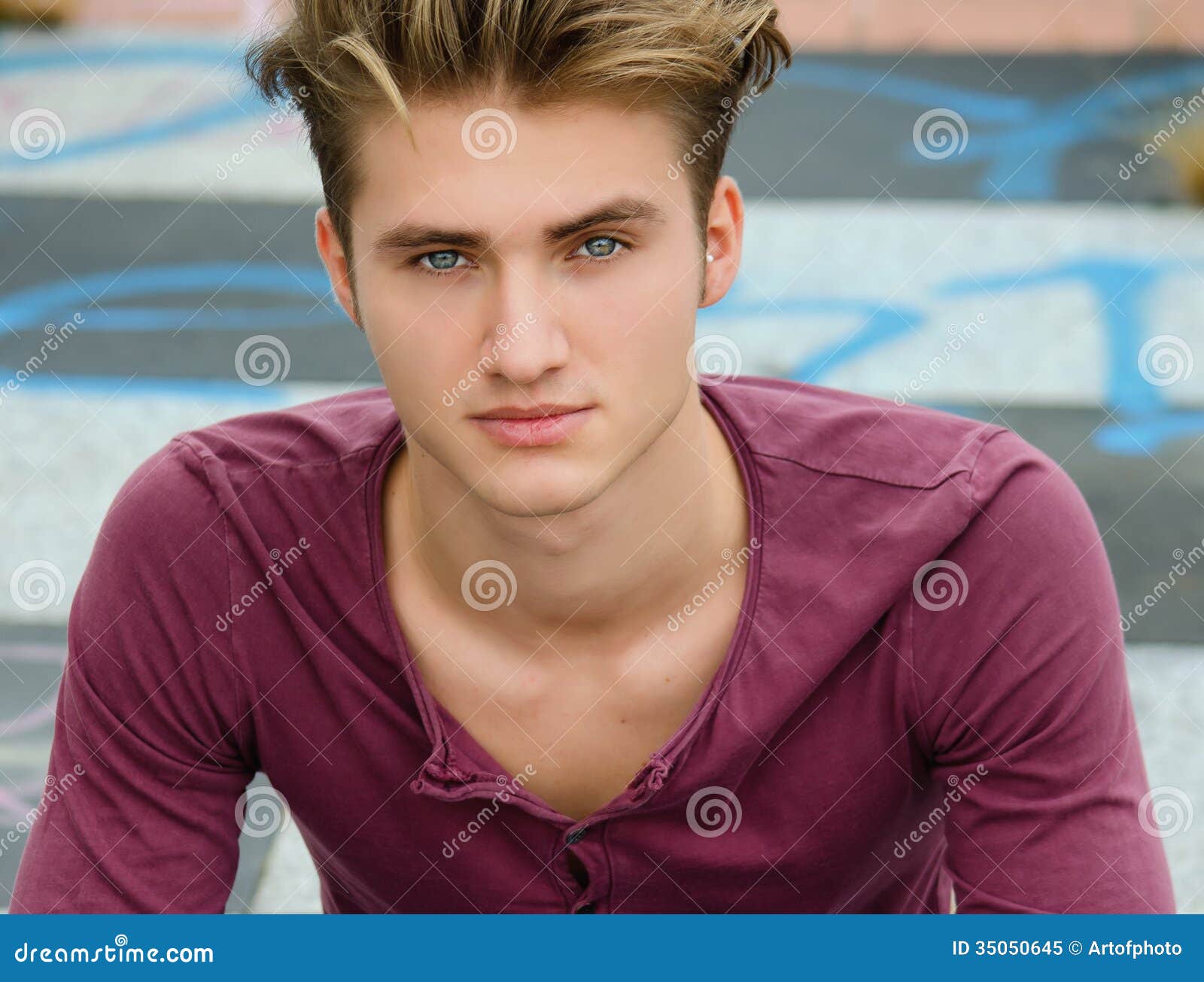 handsome man with blue eyes and brown hair