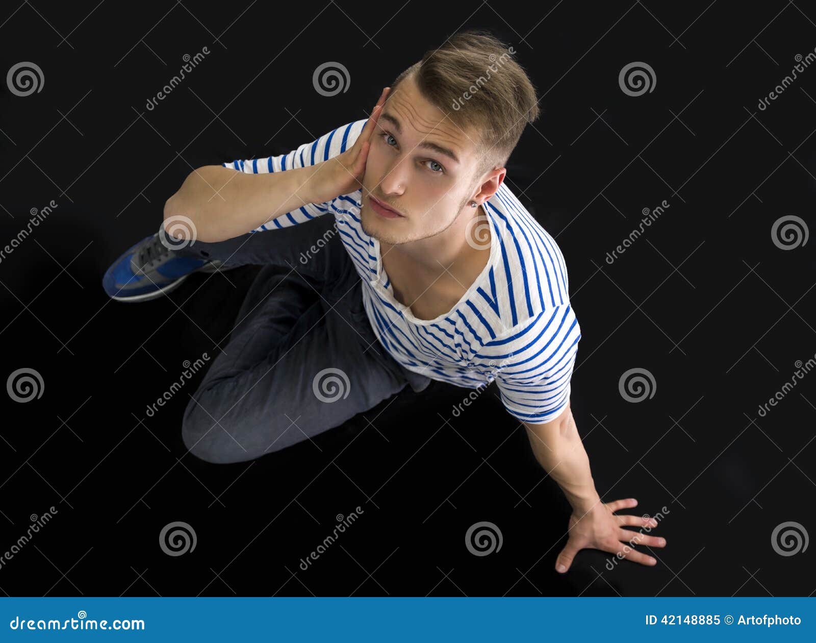 Handsome Blond Young Man Sitting, Shot from Above Stock Image Image