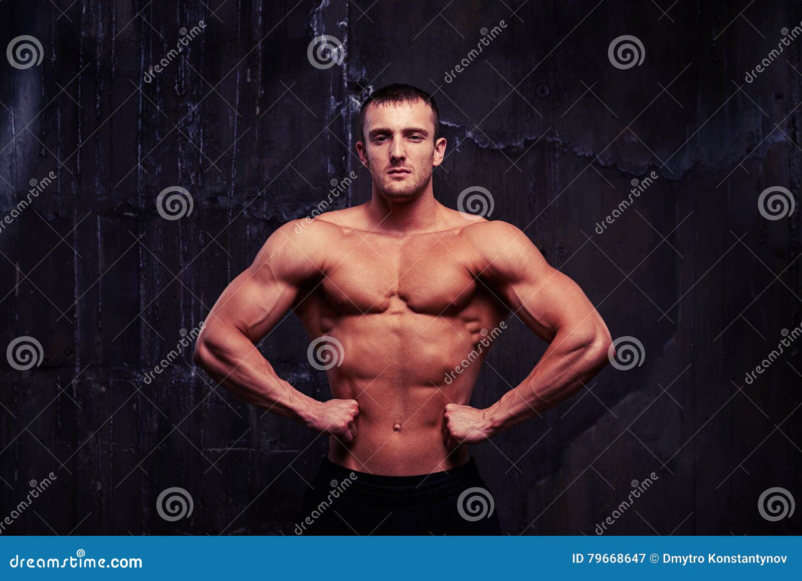 Handsome Muscular Young Bodybuilder Showing His Stock 
