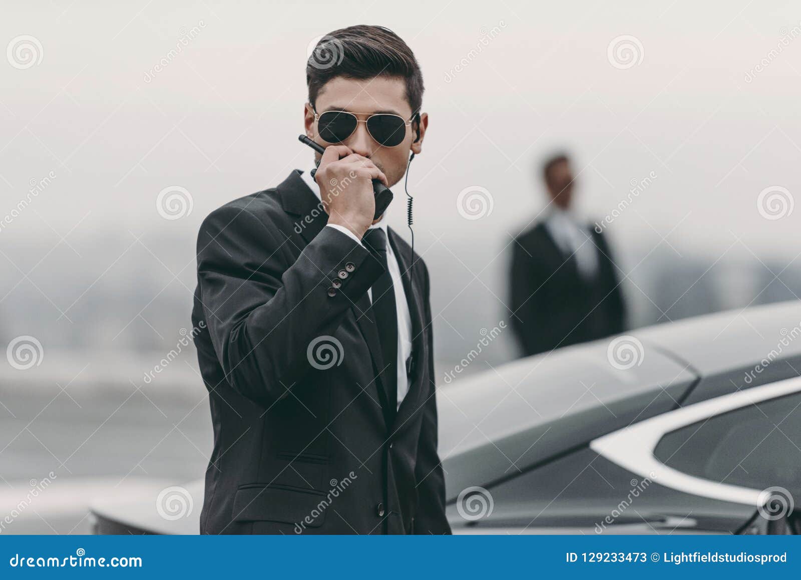 Handsome Bodyguard in Sunglasses Talking Stock Image Image of helipad