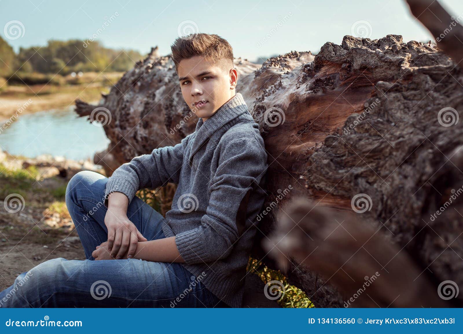 Handsome Young Boy Sitting Outdoor Stock Photo - Image of camera ...