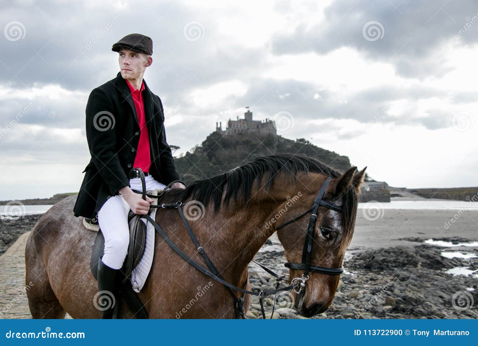 Handsome Male Horse Rider Riding Horse on Beach in Traditional Fashion ...