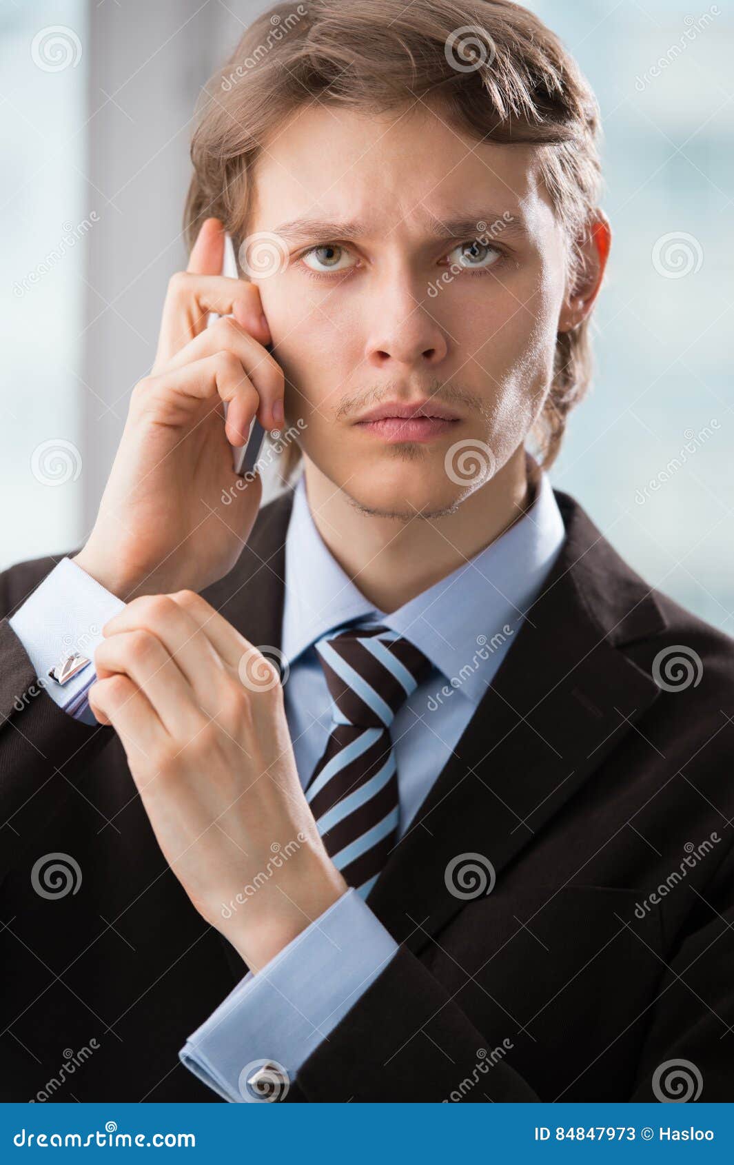 Handsome Business Man Using Cell Phone Stock Image - Image of people