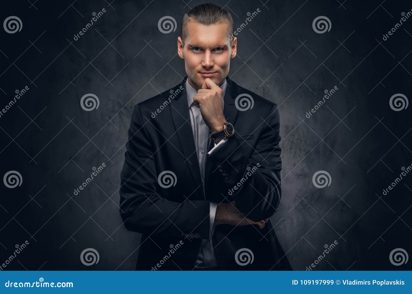 Handsome Businessman Against a Dark Background. Stock Image - Image of ...