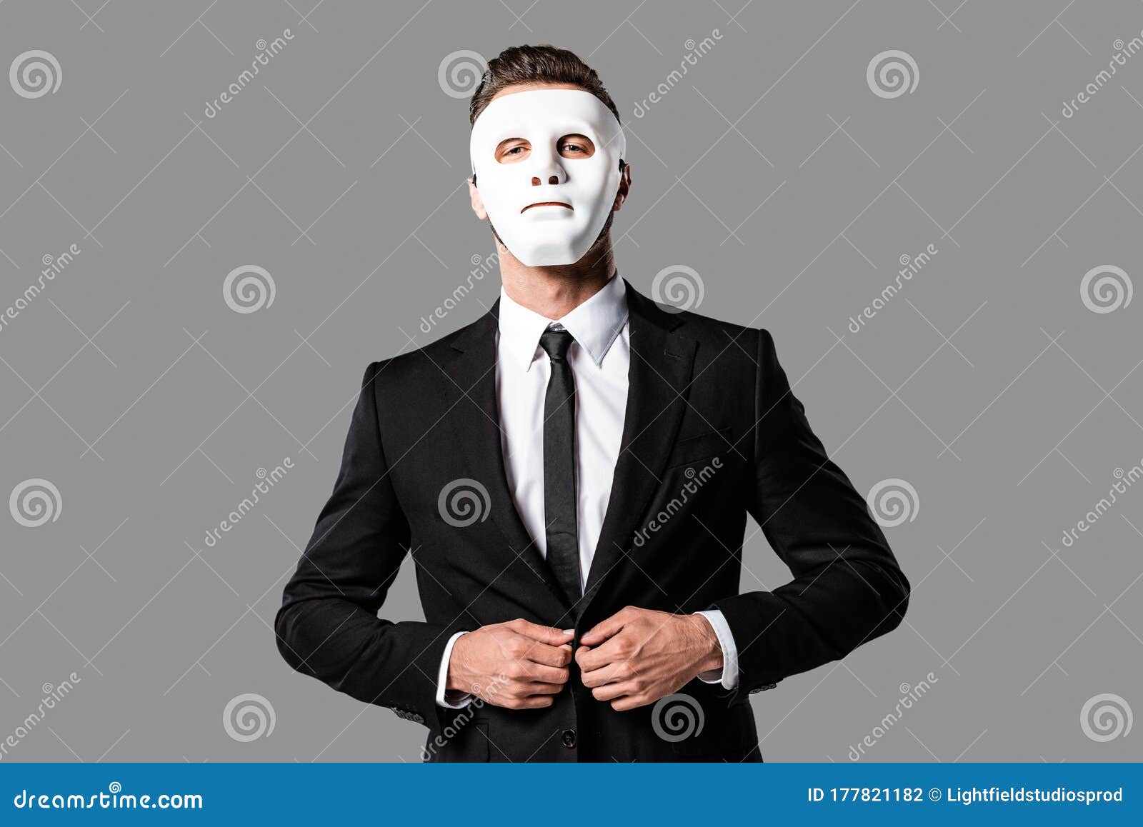 Handsome Businessman in Black Suit and White Mask Isolated on Grey Photo - Image mysterious: 177821182