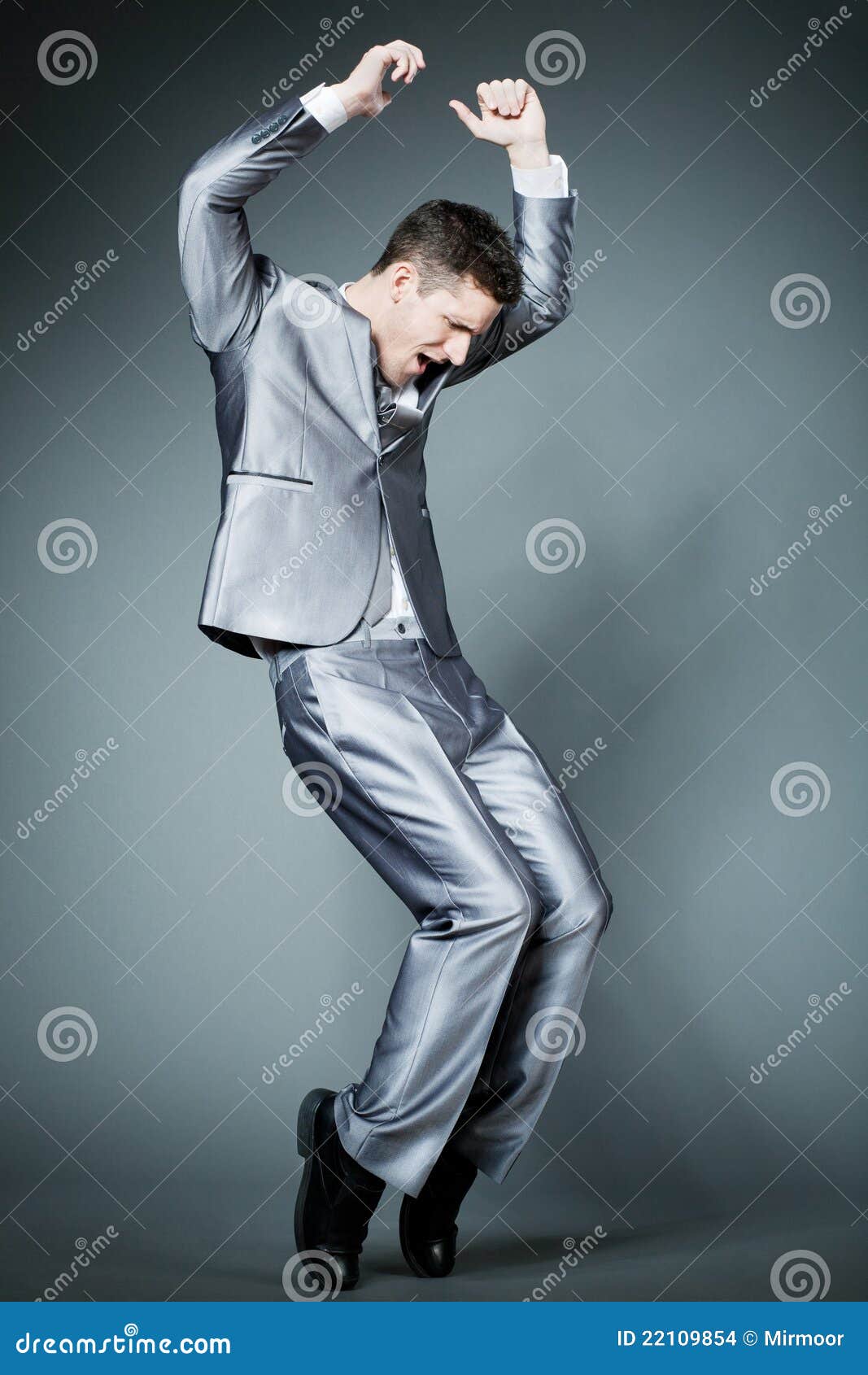 Handsome Businessman in Silver Suit Dancing. Stock Photo Image of