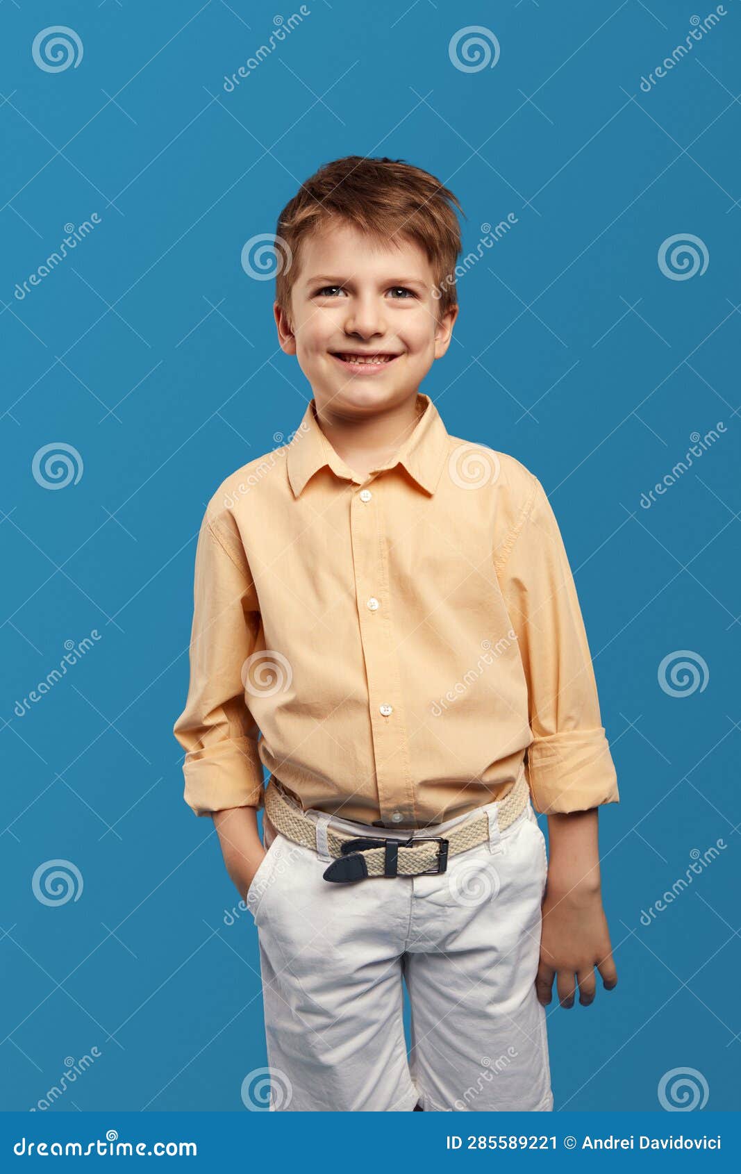 Handsome Cute Child Boy Wearing Trendy Beige Shirt, Smiling for Camera ...