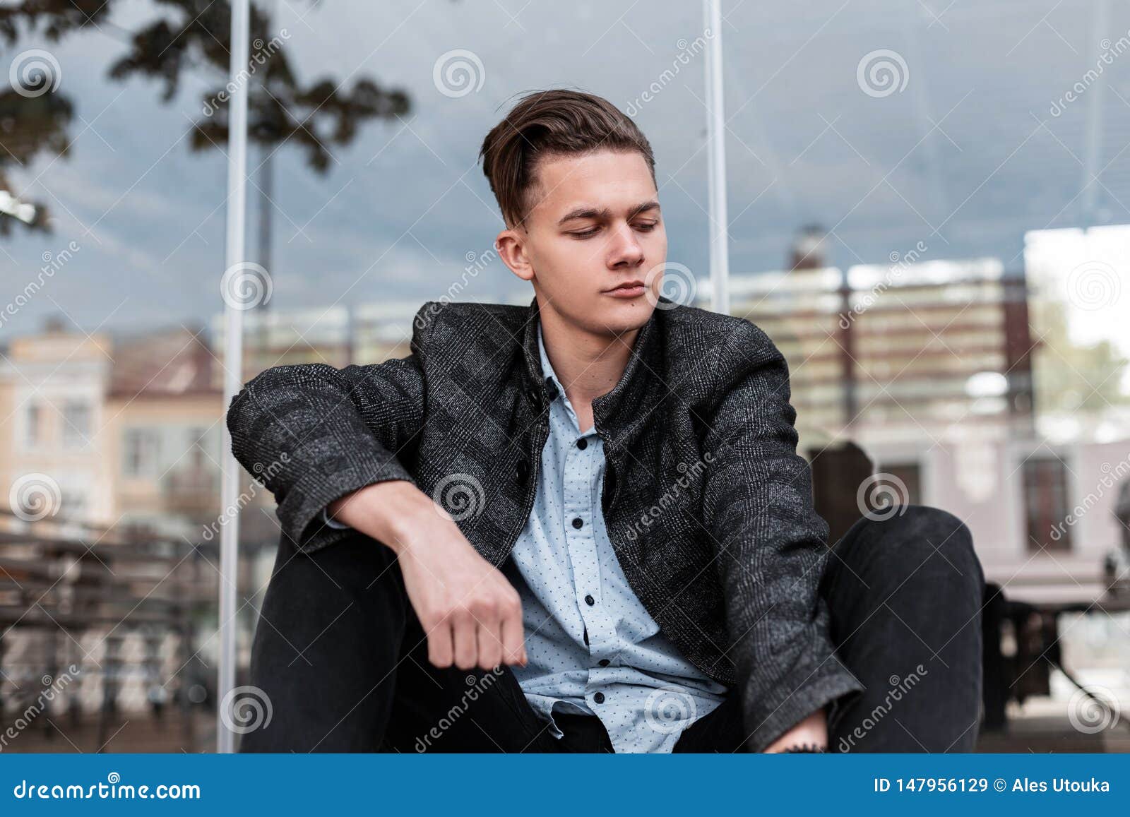 European Handsome Young Man With Trendy Hairstyle In A 
