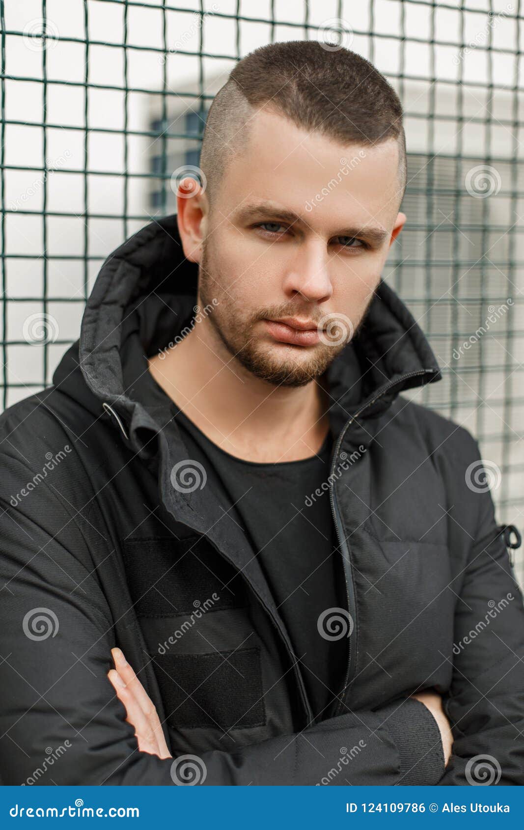 Handsome Fashionable Young Man With A Short Hairstyle Stock Photo