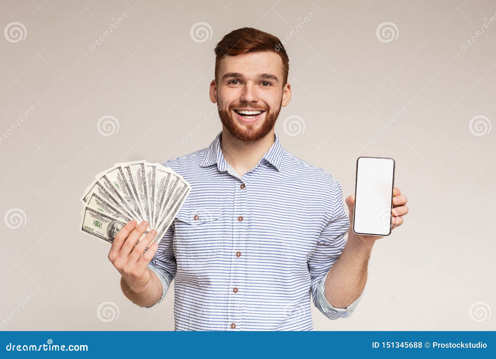 Handsome Guy with Cellphone and Fan of Dollars Stock Photo - Image of