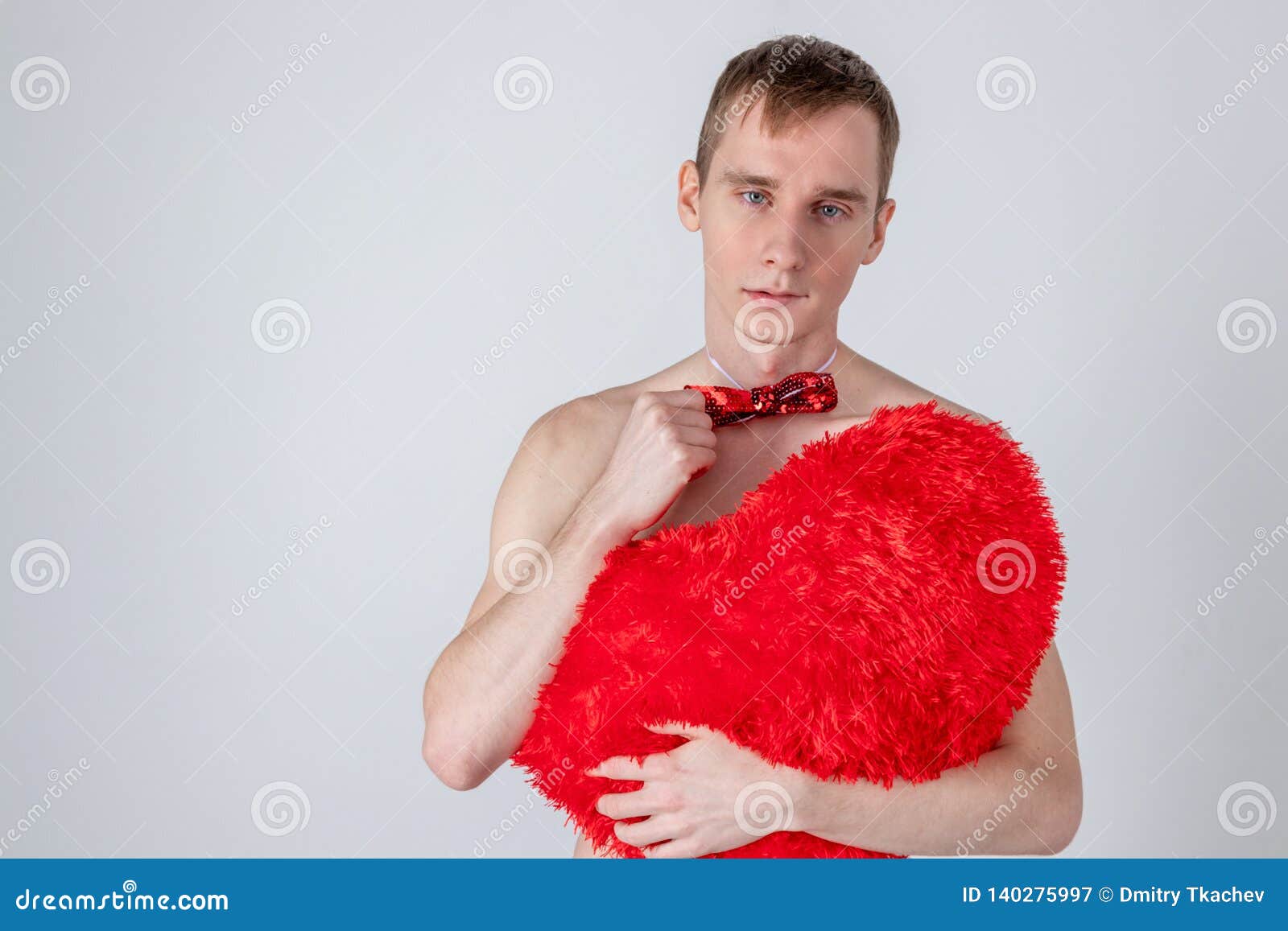 Handsome Guy Hold Big Red Heart On White Background Love And Romantic