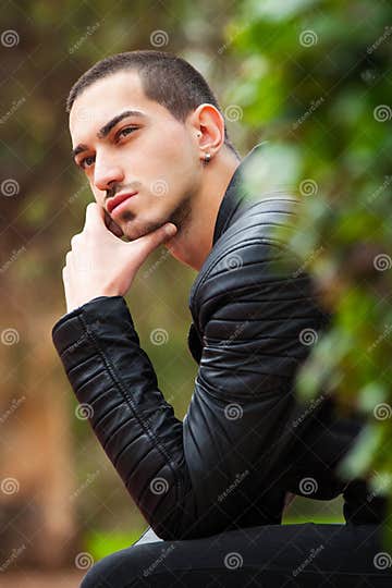 Handsome Guy Sitting Thinking. Short Hair Stock Photo - Image of face ...