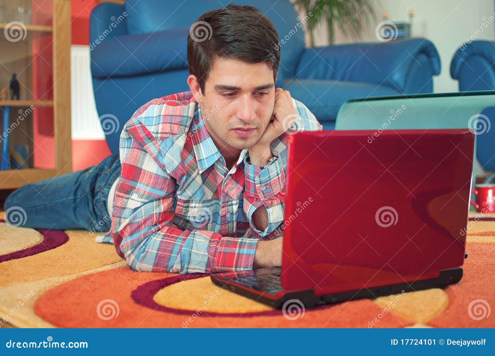 Handsome Guy Using Laptop While Lying On A Floor Stock Image Image Of Confident Home 17724101