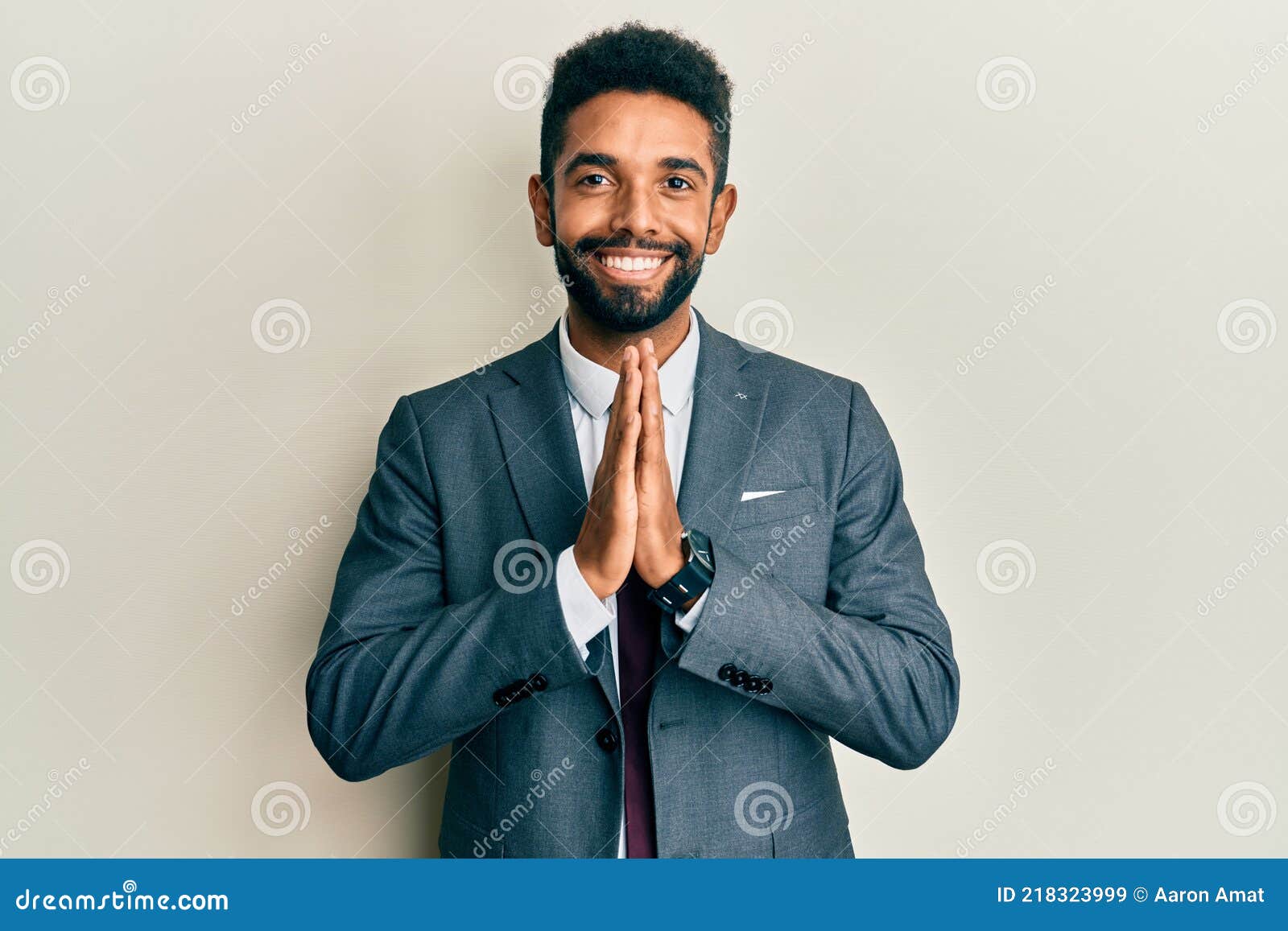 Handsome Hispanic Man with Beard Wearing Business Suit and Tie Praying ...