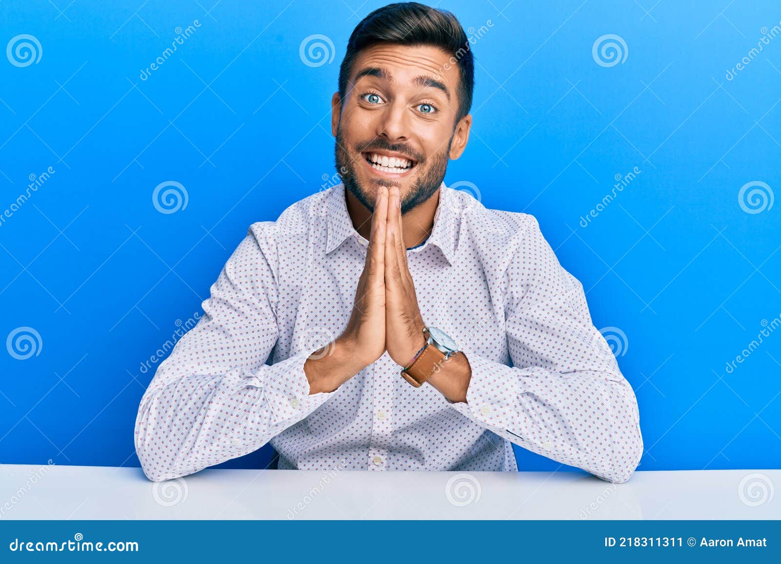 Handsome Hispanic Man Wearing Business Clothes Sitting on the Table ...