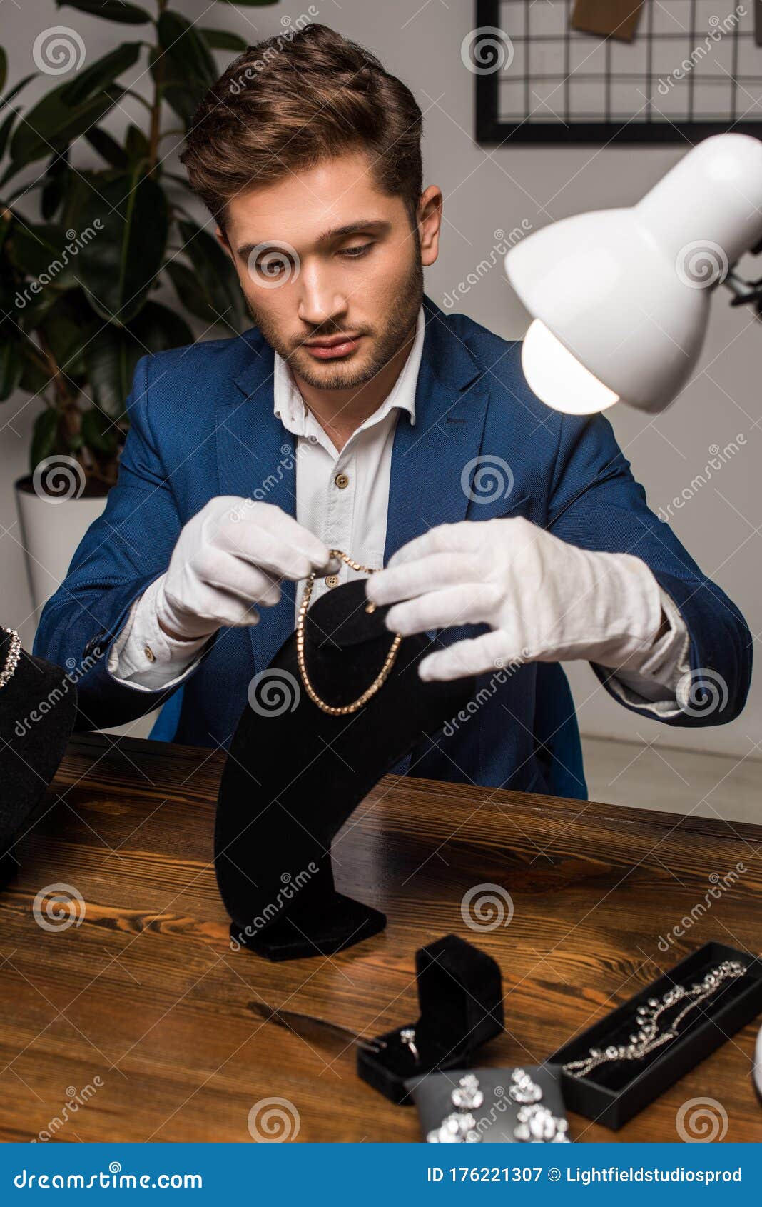 Jewelry Appraiser In Gloves Holding Necklace Stock Image ...