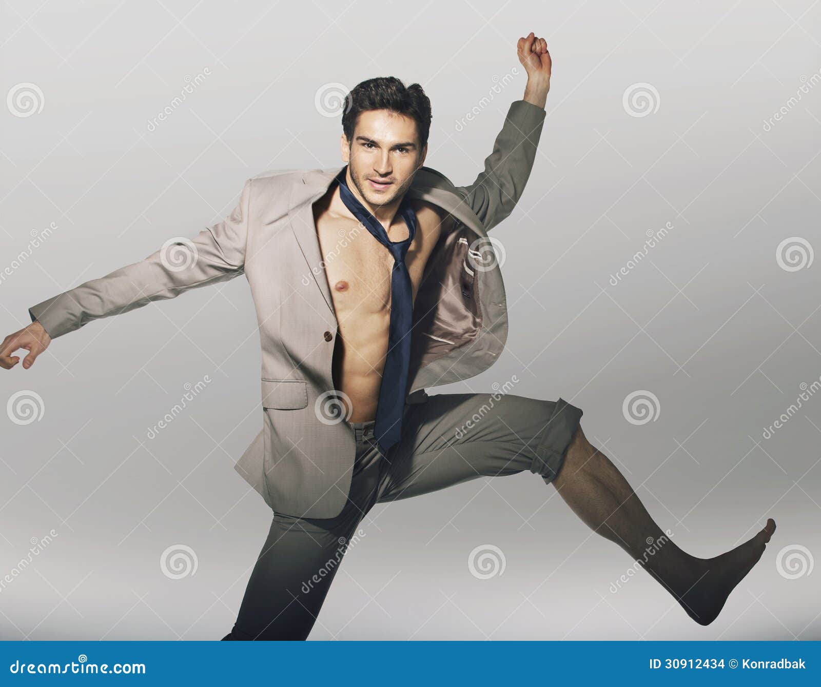 Handsome Jumping Guy with Funny Tie Stock Photo - Image of lifestyle,  elegant: 30912434