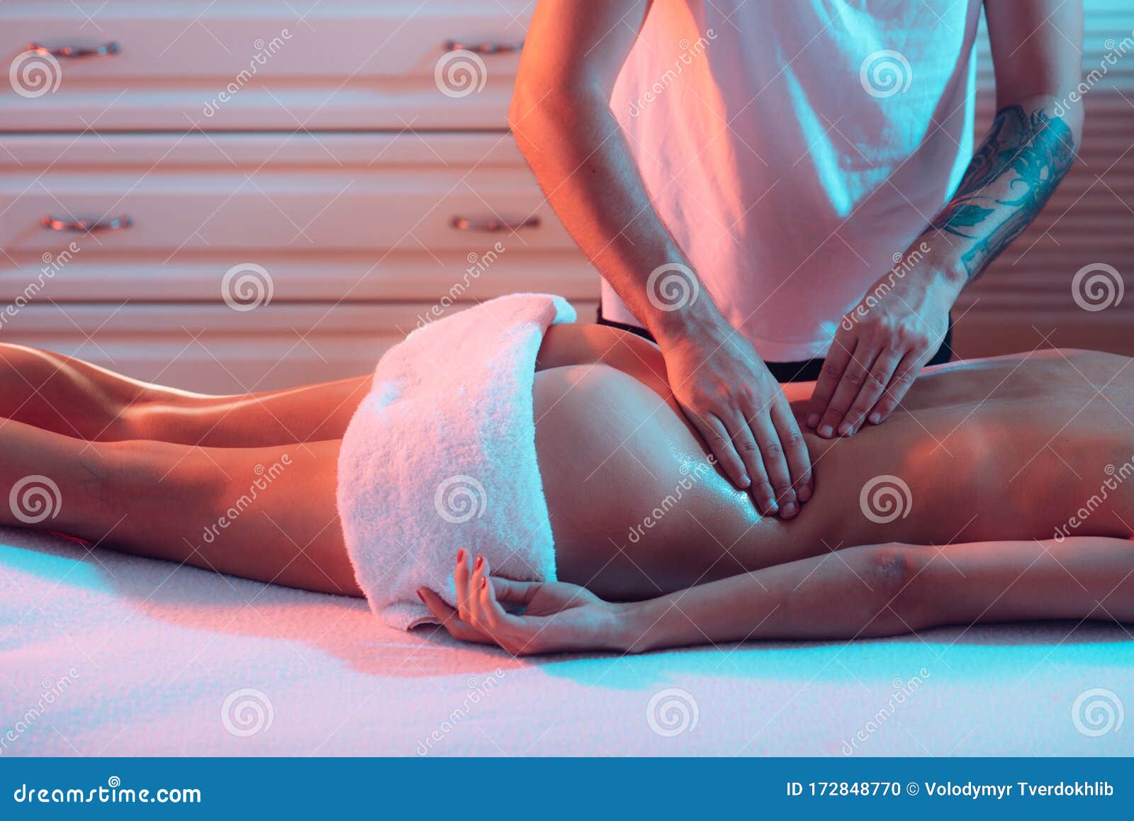 Handsome Loving Husband Doing Massage Spa Procedure Carefully and Tenderly for His Beautiful Wife