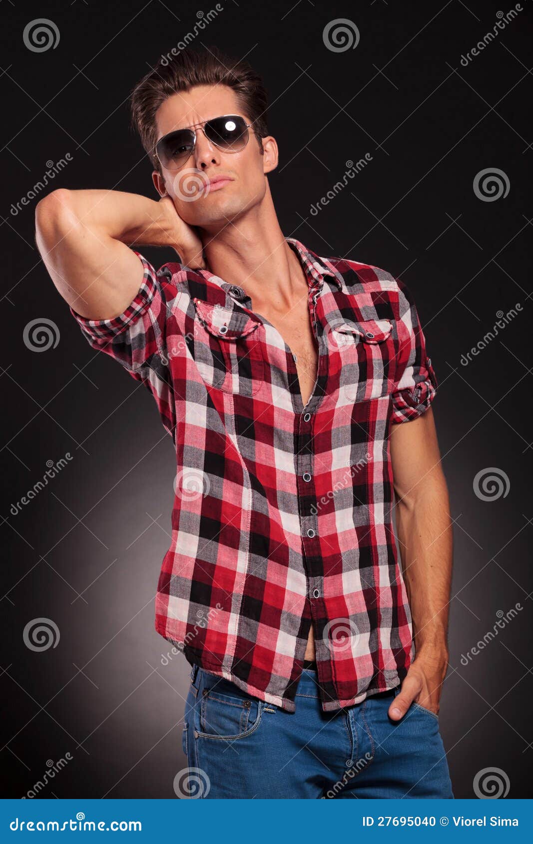 Handsome Male Model In Sunglasses Posing Stock Photo 