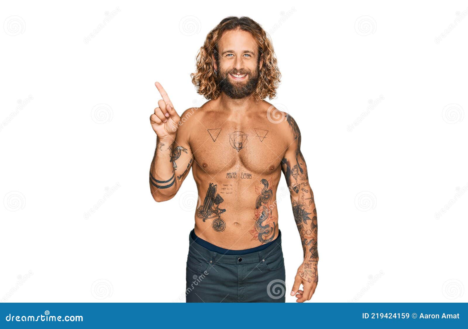 Tough looking hispanic man with long hair and tattoos Stock Photo  Adobe  Stock
