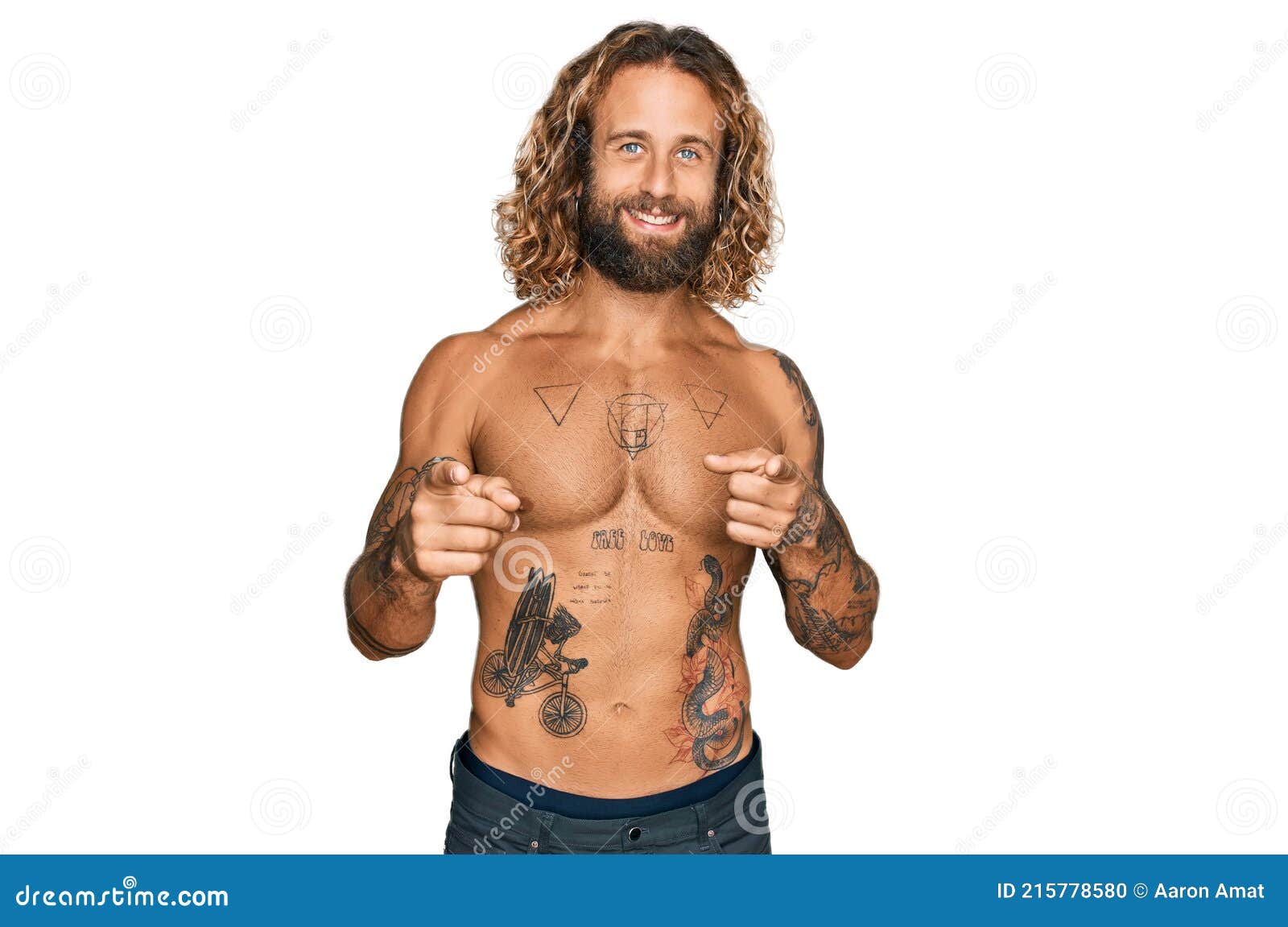 Handsome Man with Beard and Long Hair Standing Shirtless Showing Tattoos Pointing Fingers To Camera with Happy and Funny Face Stock Photo - Image of funny, background: 215778580 Handsome Man with Beard and Long Hair Standing Shirtless Showing Tattoos Pointing Fingers To Camera with Happy and Funny Face Stock Photo - Image of funny, background: 215778580
