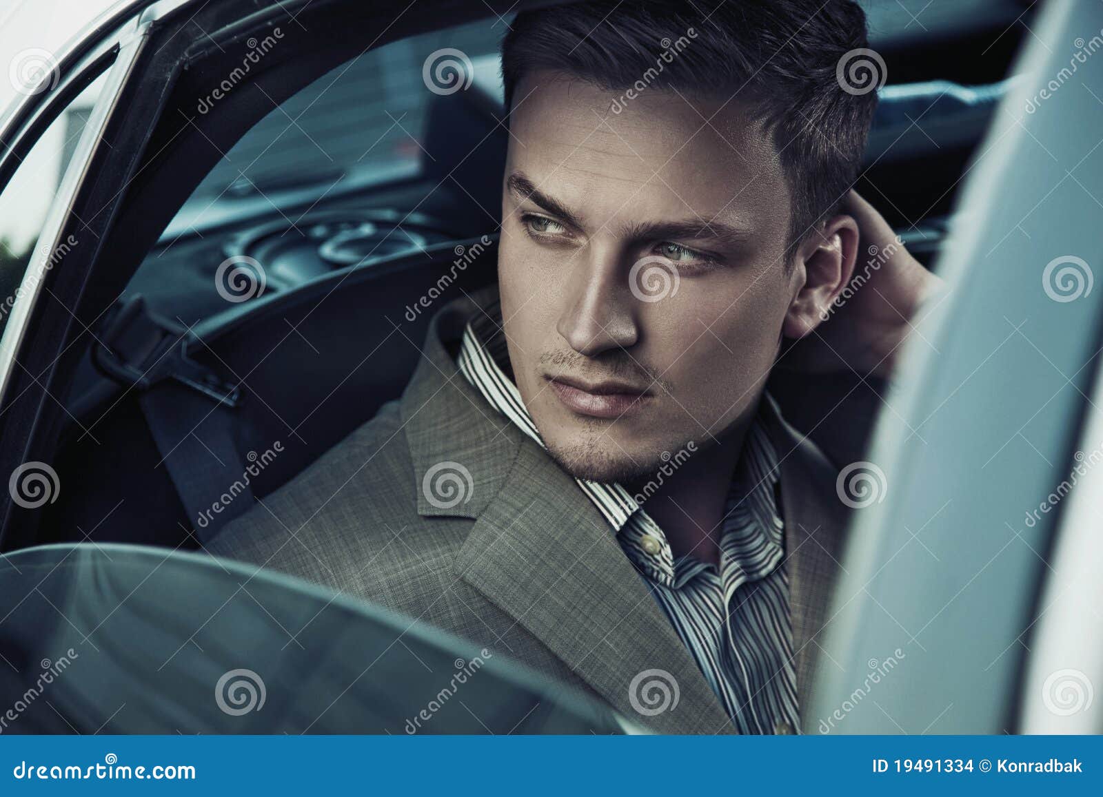 handsome man in car