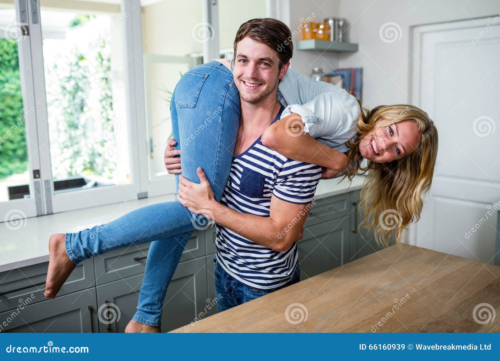 Handsome Man Carrying His Wife Stock Image Image Of Looking