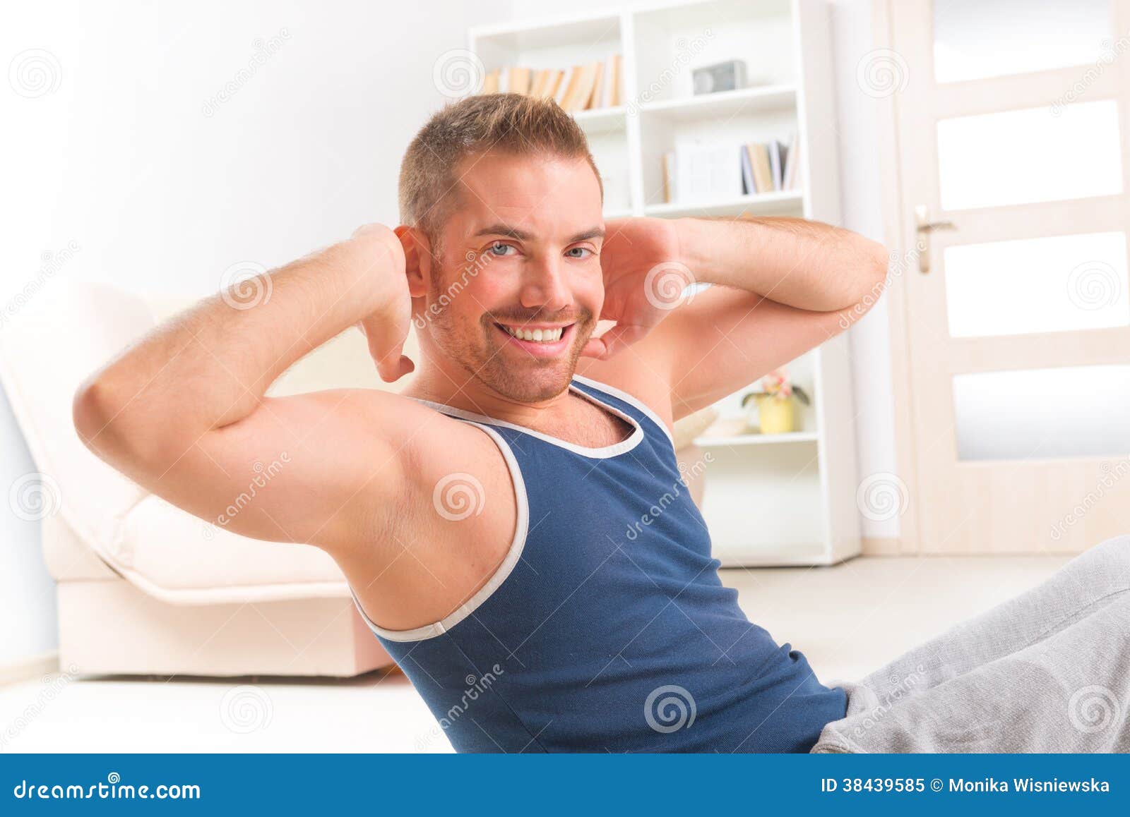 Handsome man doing sit ups stock image. Image of health - 38439585