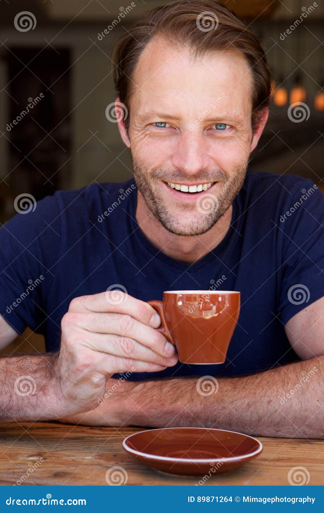 Handsome Man Drinking Coffee and Smiling Stock Photo Image of happy