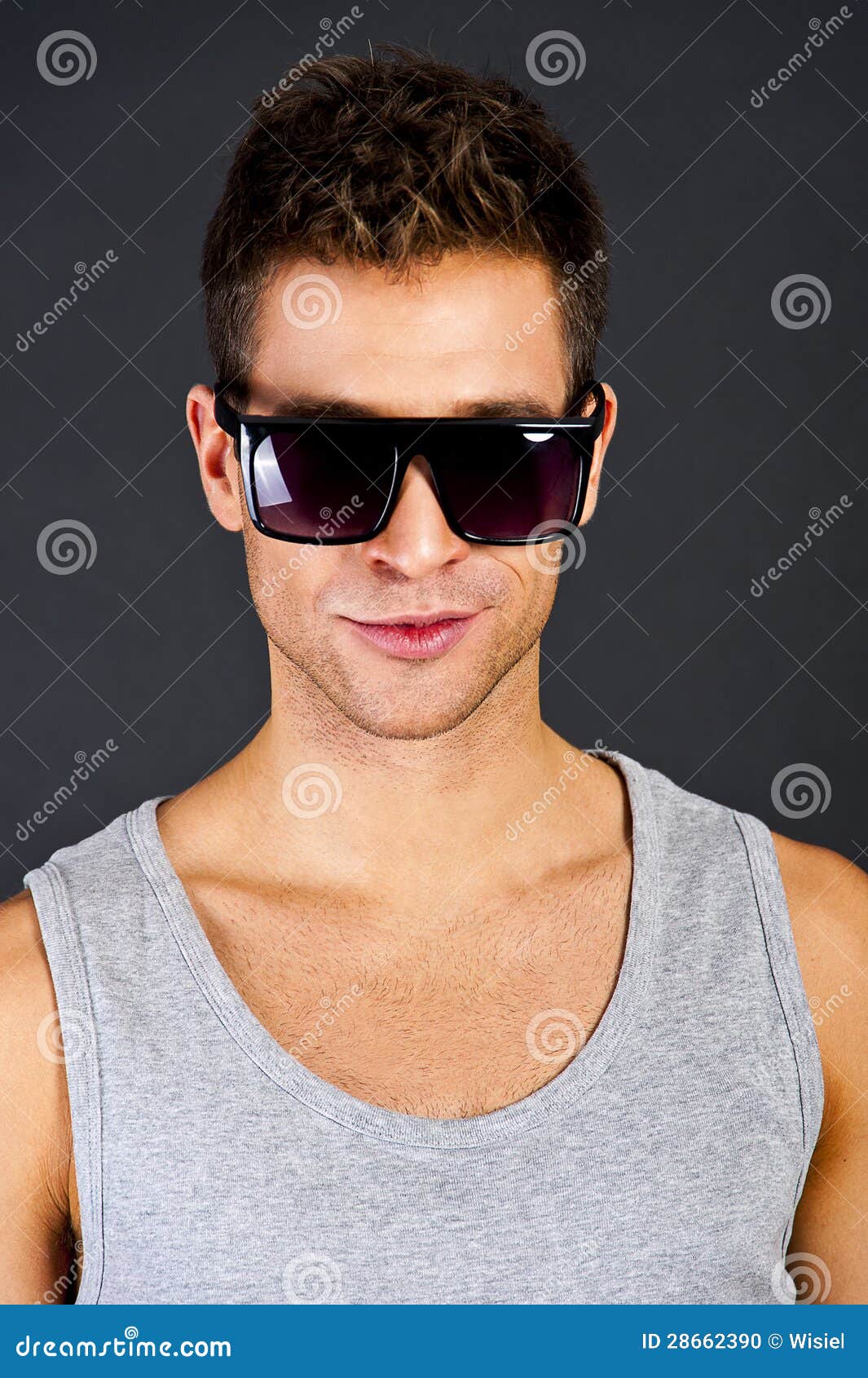 Handsome Man in Gray Tank Top with Smile and Sunglasses Stock Photo ...