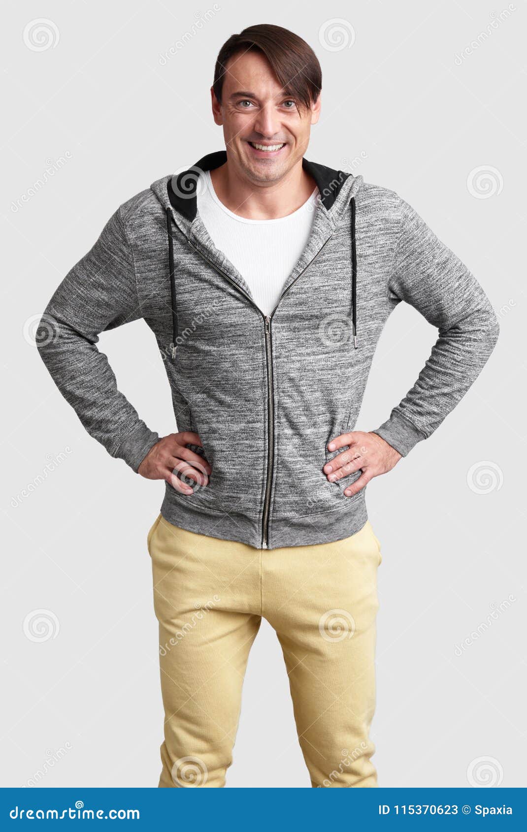 Handsome Man with His Hands on Hips. Isolated Stock Image - Image of ...