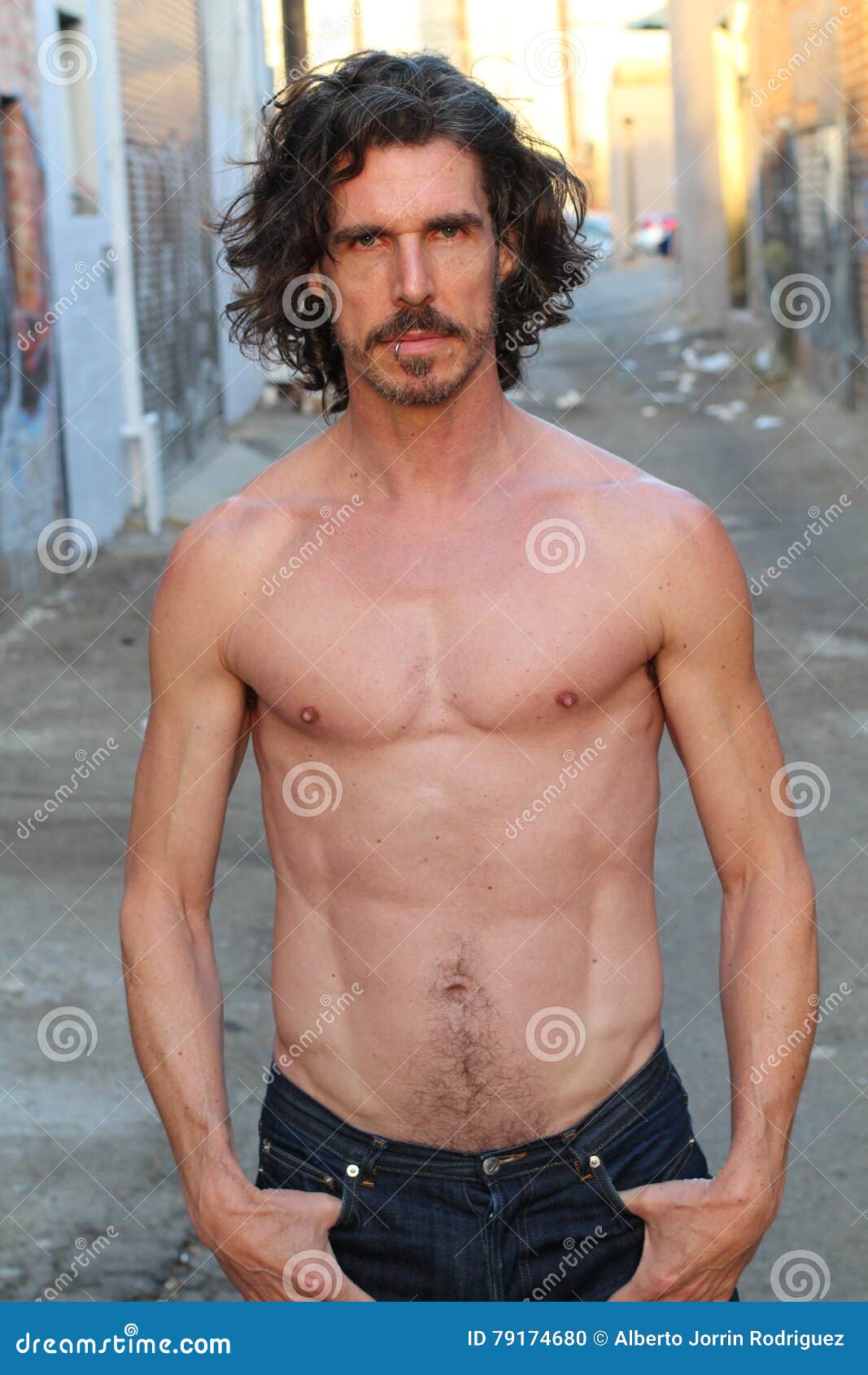 Handsome Man with Long Hair and Beard. he is Posing in Front of Camera Just with Open Jeans and Showing His Muscles. Abdominals Stock Photo - Image of fresh, model: 79174680 Handsome Man with Long Hair and Beard. he is Posing in Front of Camera Just with Open Jeans and Showing His Muscles. Abdominals Stock Photo - Image of fresh, model: 79174680