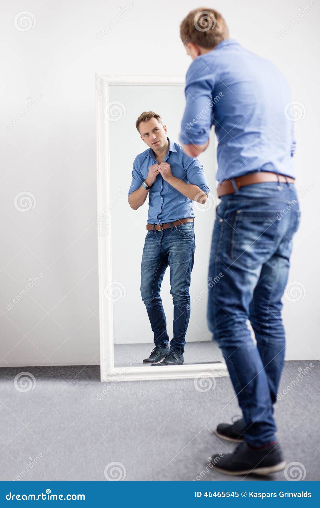 Handsome Man Looking At Himself In Mirror Stock Photo 