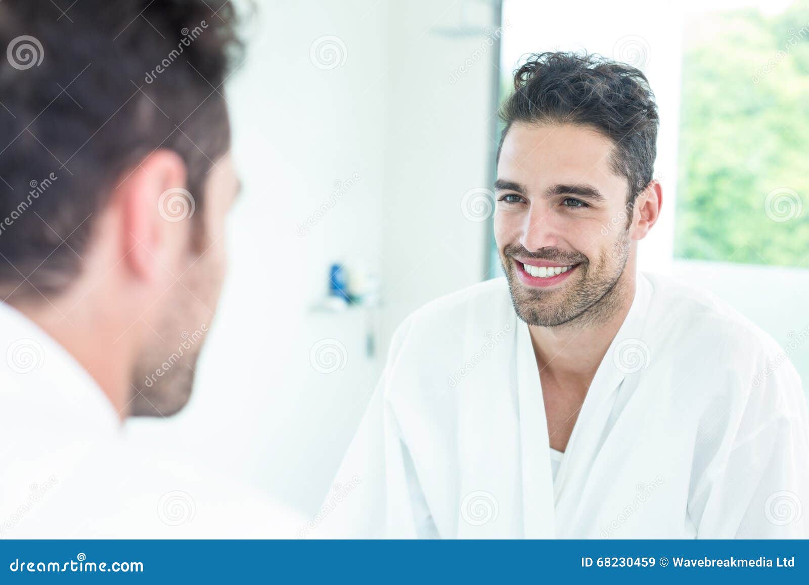 Handsome Man Looking In Mirror Stock Photo - Image: 68230459
