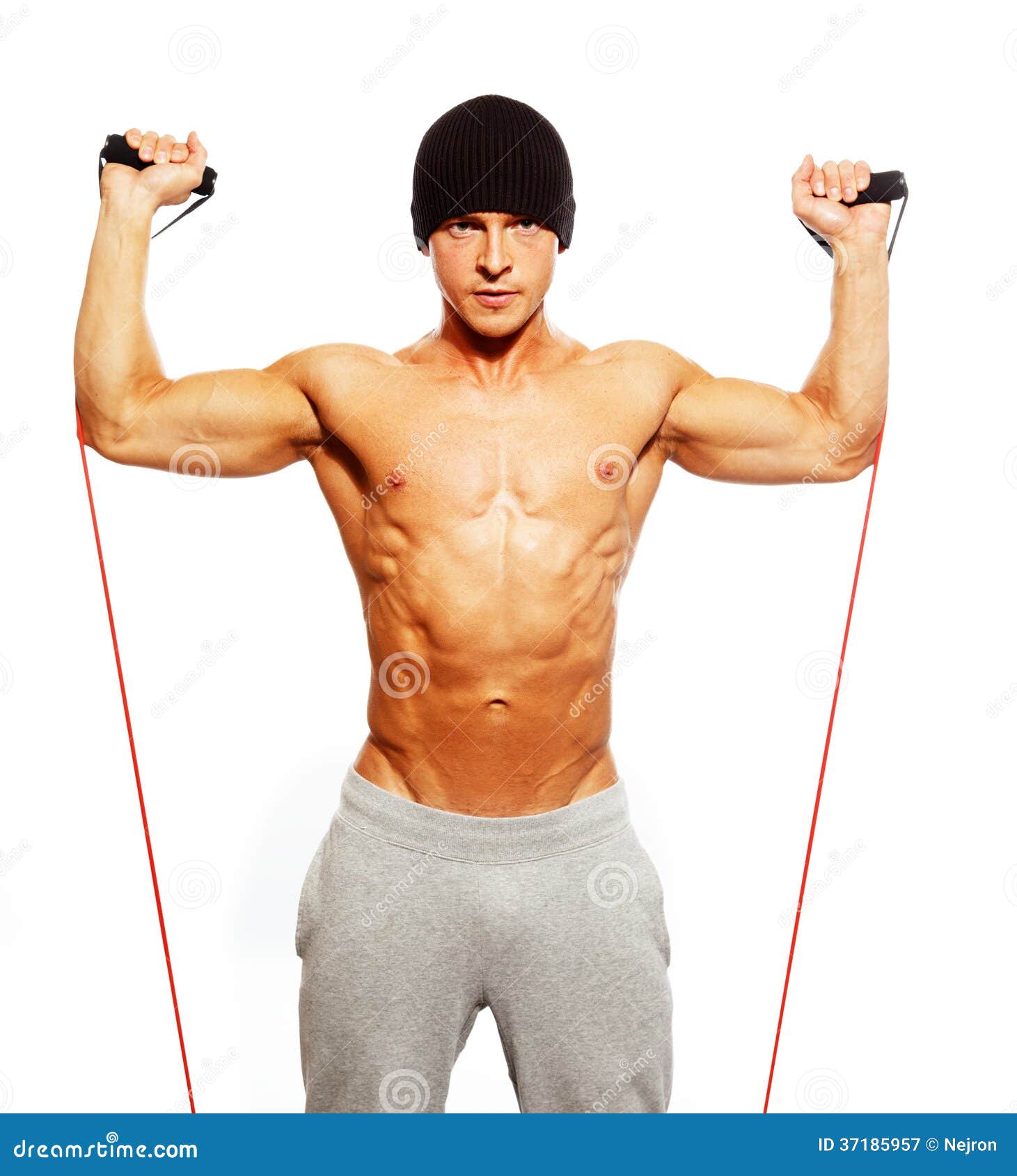 Young Smiling Bodybuilder Holding Stock Photos 
