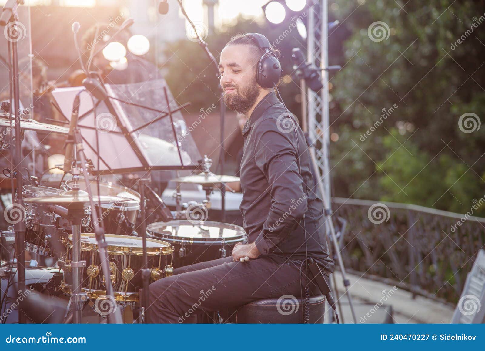 Handsome Man Musician Sitting at Drum Kit on the Street Stock Image ...