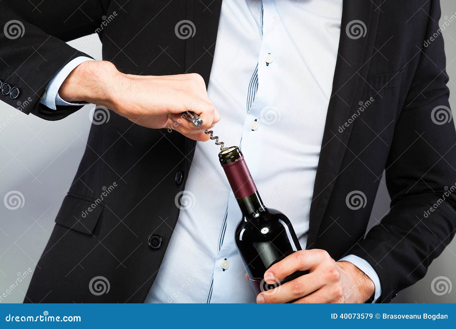 Handsome Man Opening Bottle of Wine Stock Image Image of person
