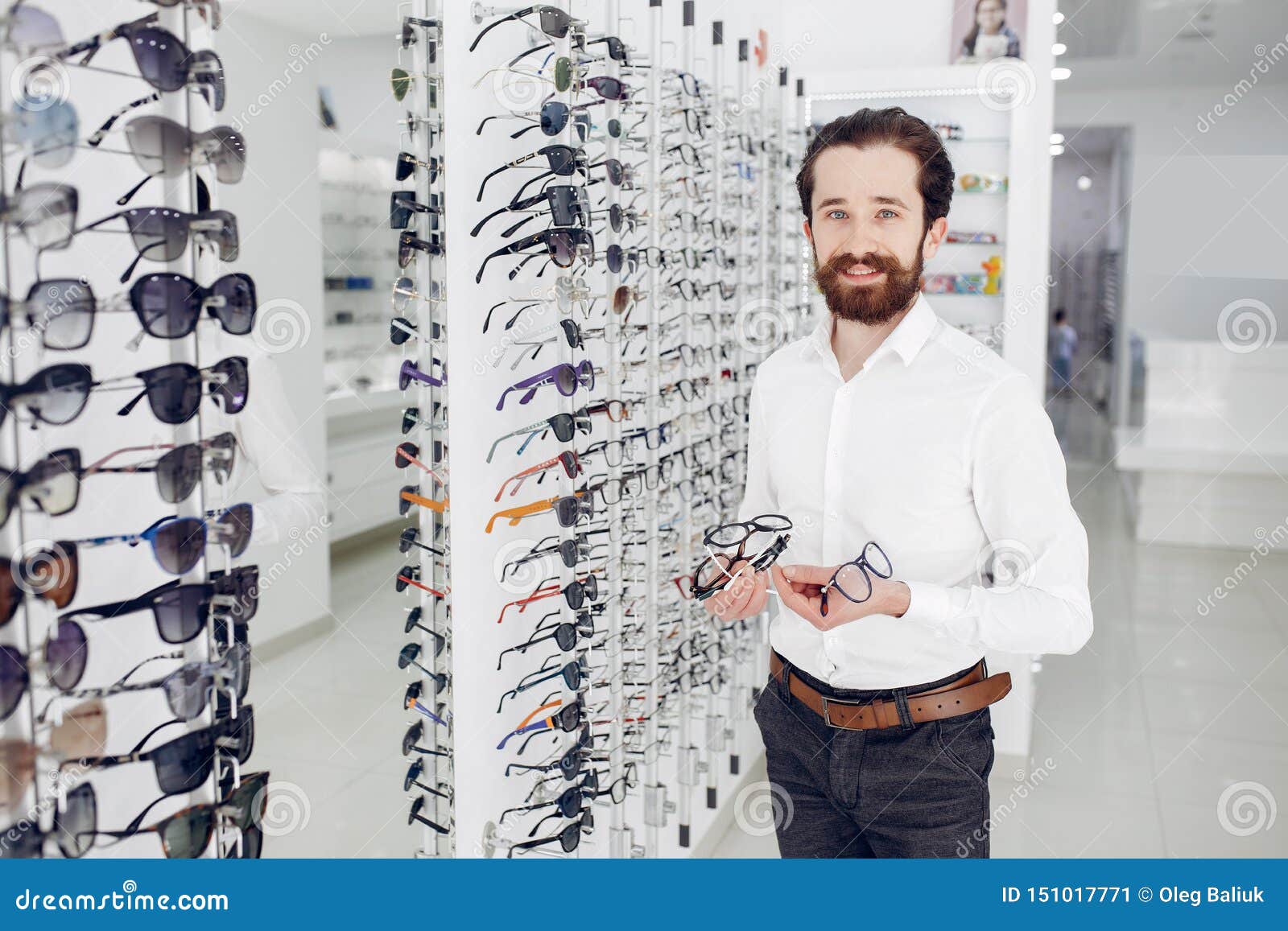 Handsome Man in a Optics Shop Stock Image - Image of medicine, optician ...