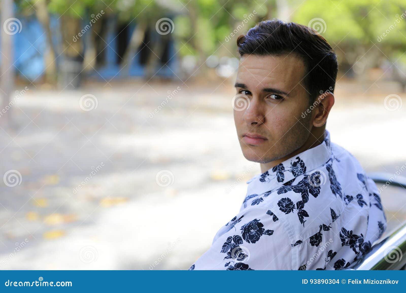 Handsome Man Over Shoulder Glance Blurry Background Stock Photo Image