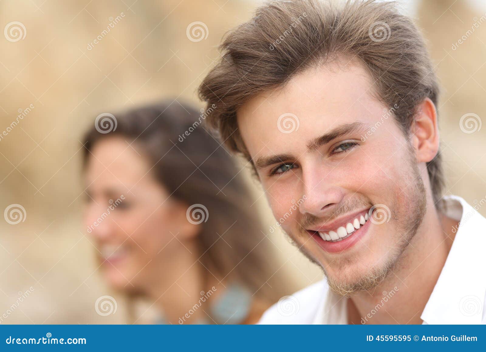handsome man portrait with a perfect white tooth and smile