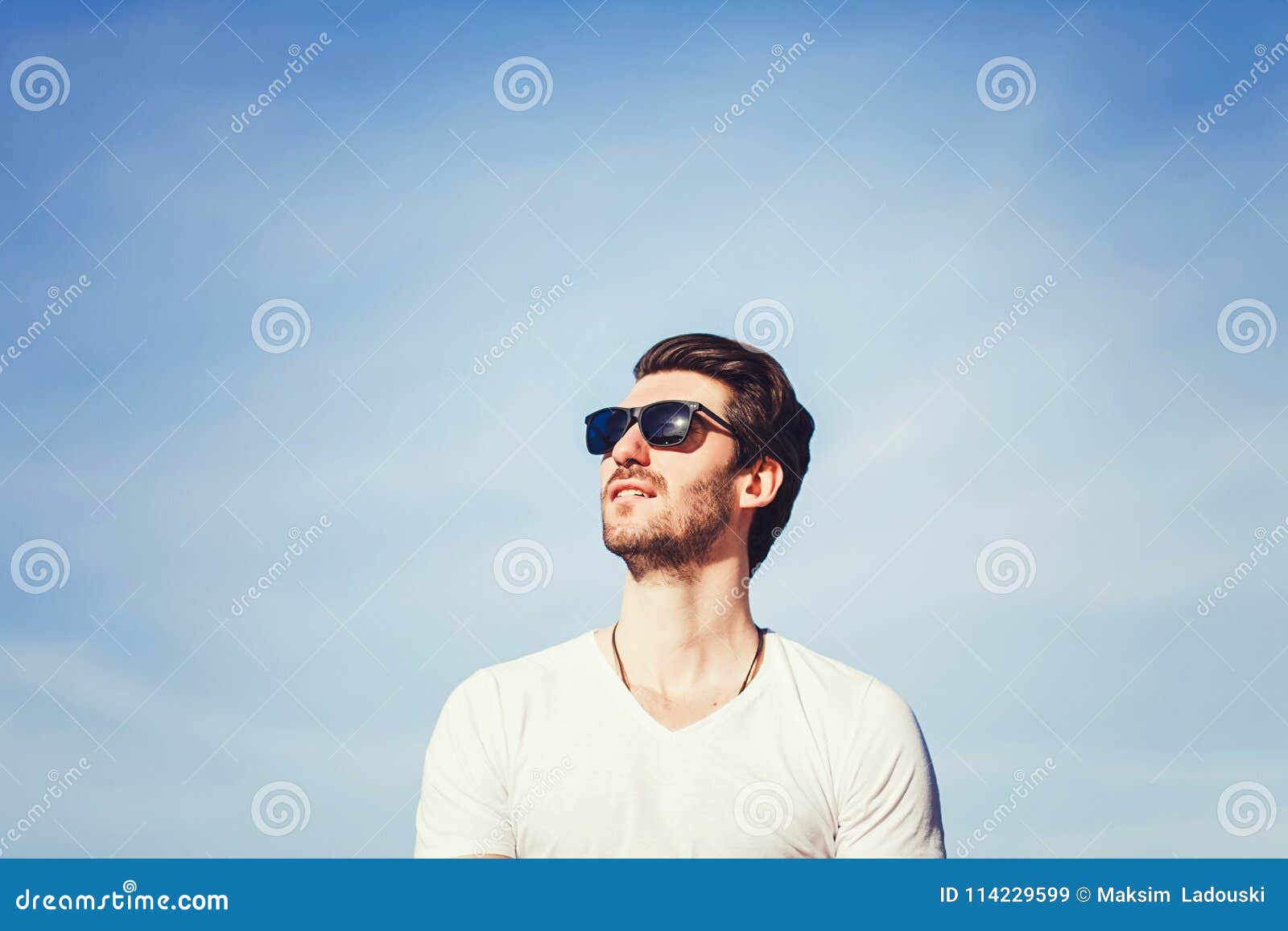 Man in Sunglasses and T-shirt Over Blue Sky Stock Image - Image of blue ...