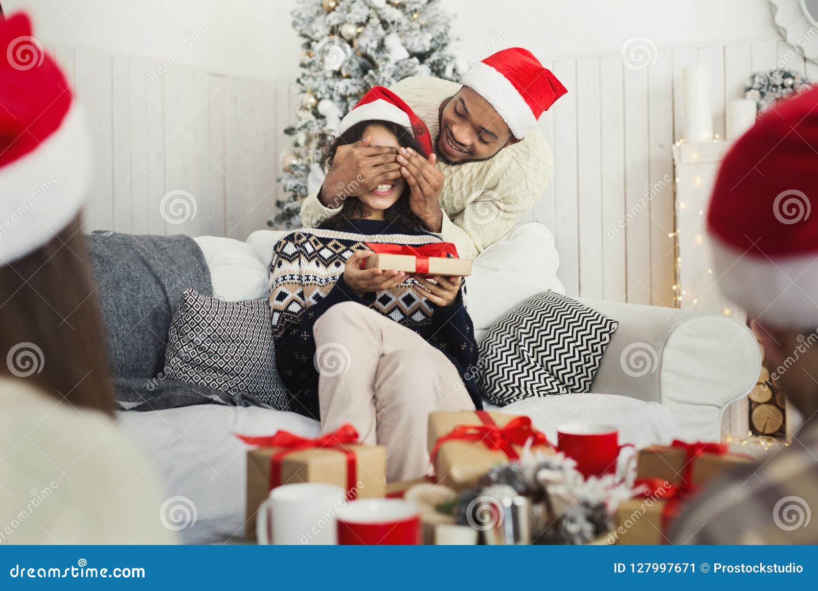 Handsome Man Surprising Girl With Christmas Present Stock Image Image Of Present Receiving