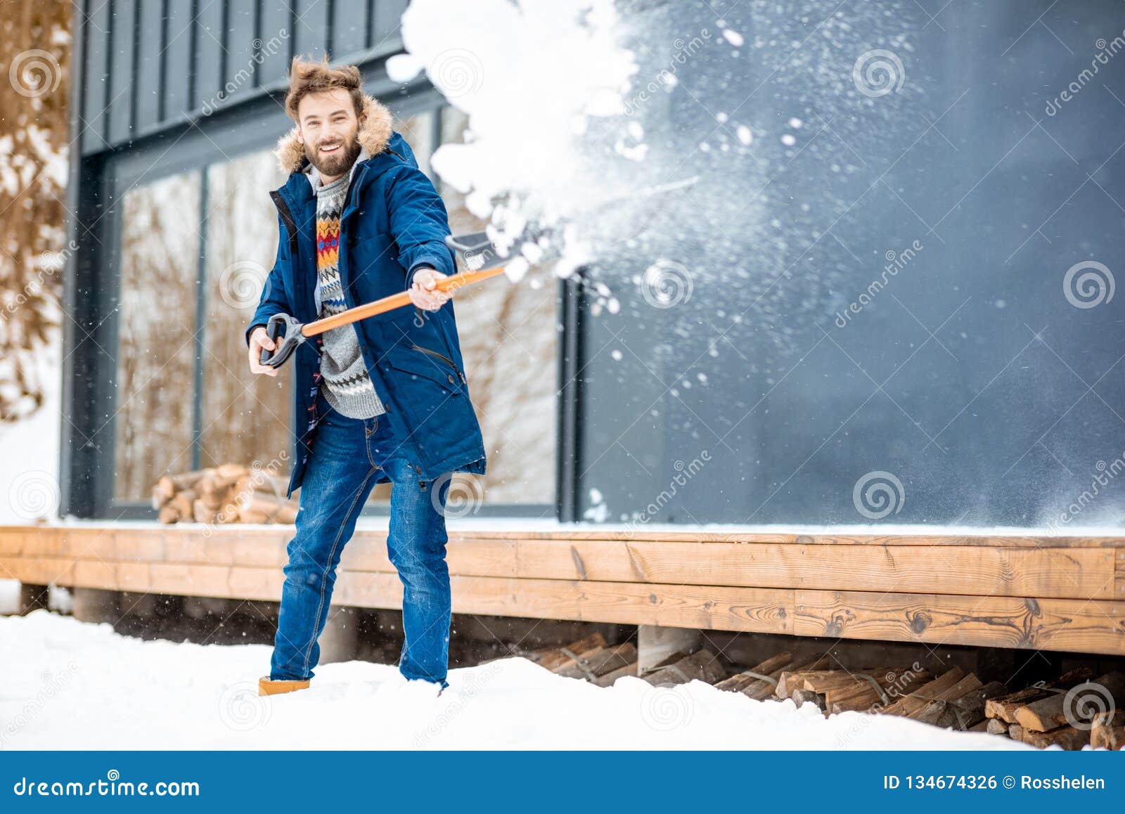 Man Cleaning Snow Near the House Stock Photo - Image of snowstorm ...