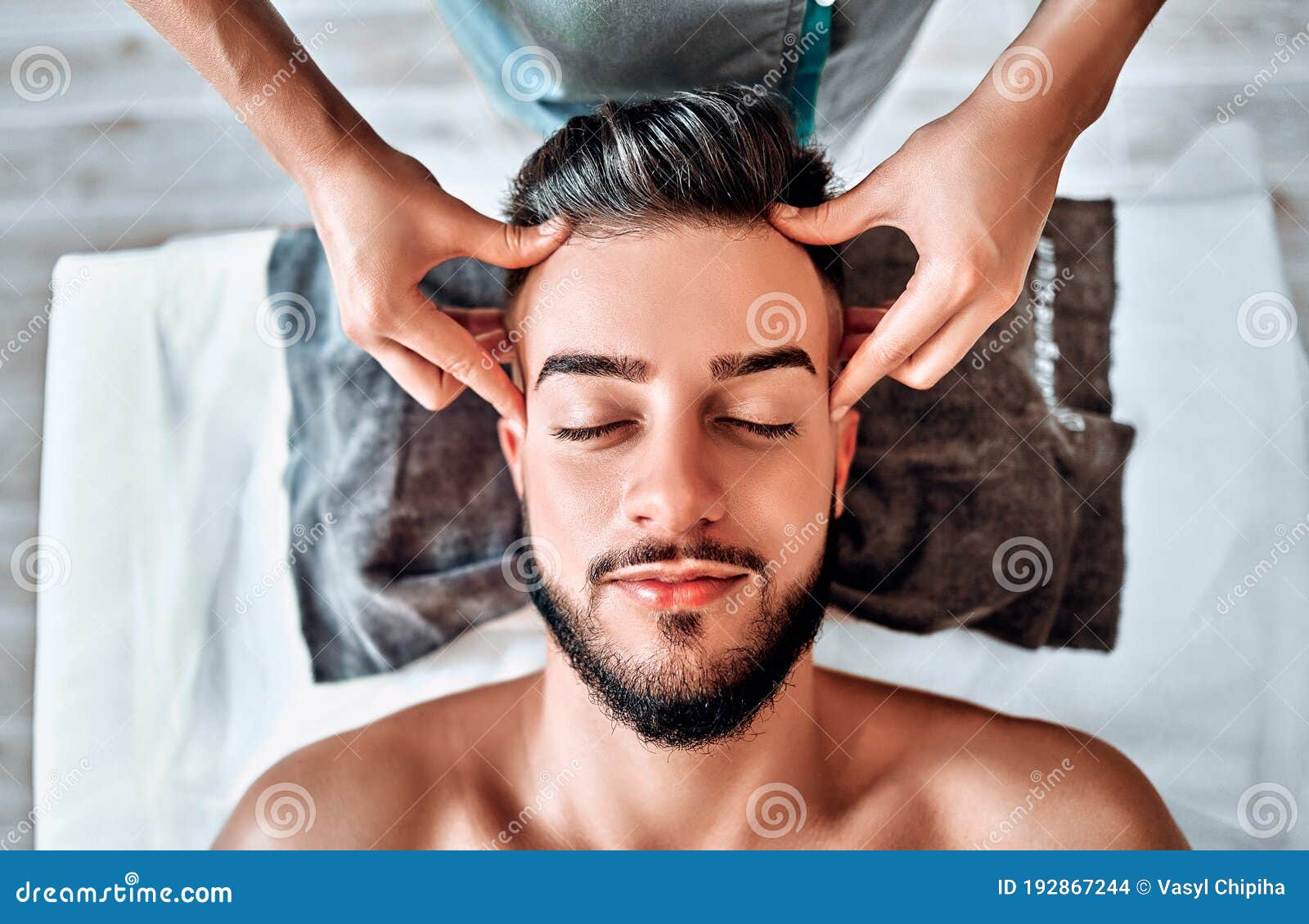 Handsome Massage Physiotherapist Doing Hand Massage Of A Female Athlete