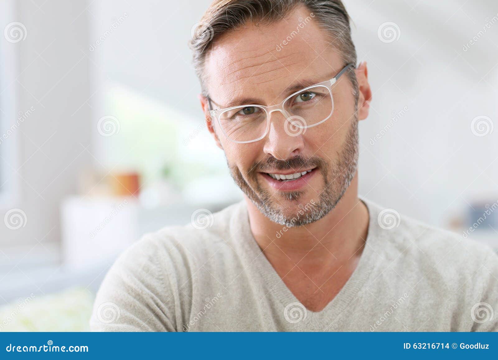 handsome middle-aged man wearing white eyeglasses